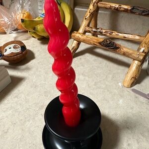 Candle holder with new candle stick